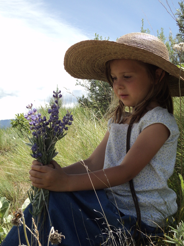 Calli with flowers at BoulderCrest Ranch